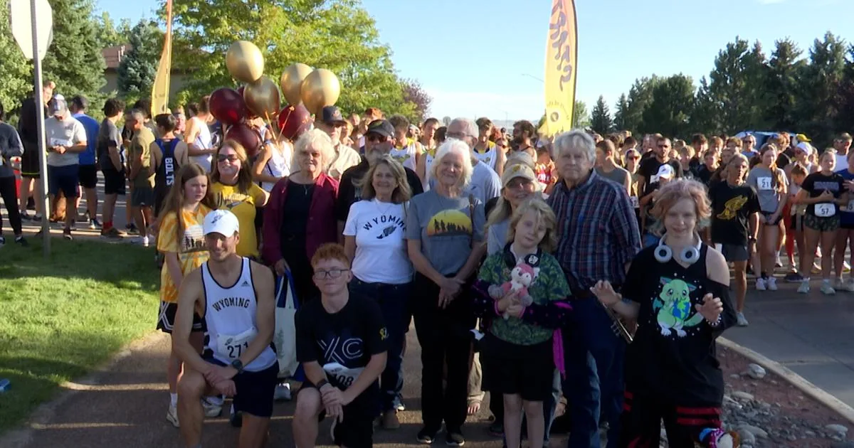 Runners and family members gather at a Gillette memorial event honoring the Wyoming 8