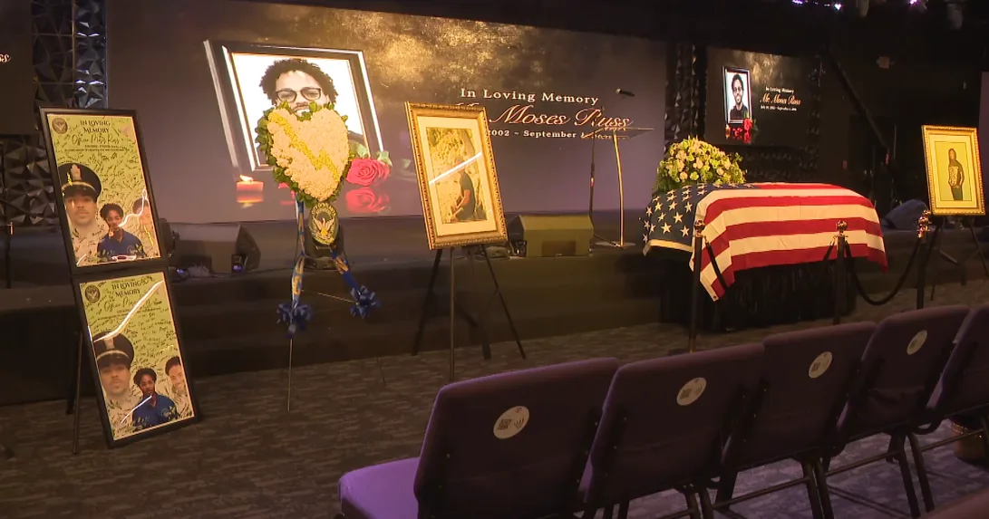 Mourners gather at a Forest Park church funeral for Atlanta police recruit Moses Russ